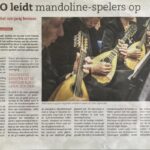 Couple on a beach swing